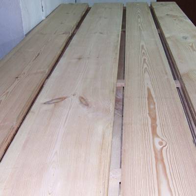 Pine floor boards cut from old beams 3